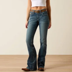 R.E.A.L. Mid Rise Whipstitch Boot Cut Jean