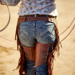 R.E.A.L. Mid Rise Whipstitch Boot Cut Jean