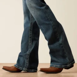 R.E.A.L. Mid Rise Whipstitch Boot Cut Jean